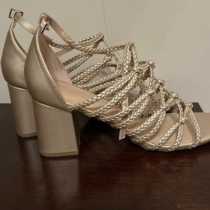 Gold high heel shoes never been worn before